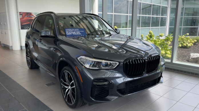 Courier Delivers in a BMW URY